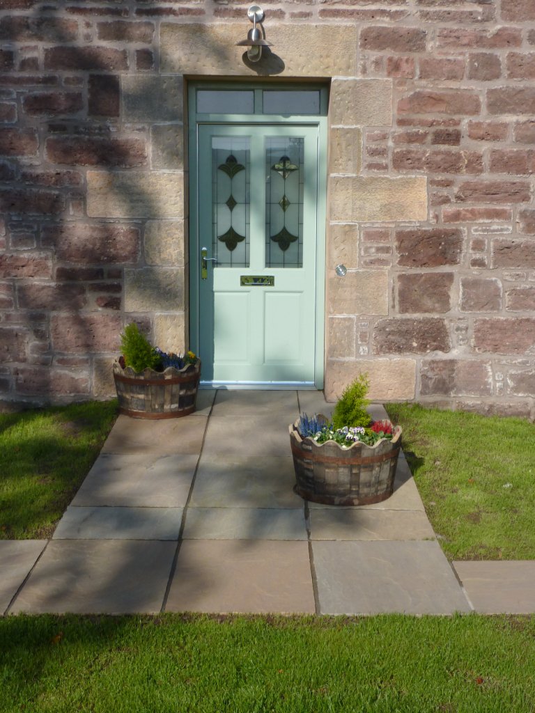 Front Entrance With Beautifully Crafted Timber Doors